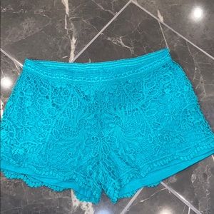 Turquoise lace shorts